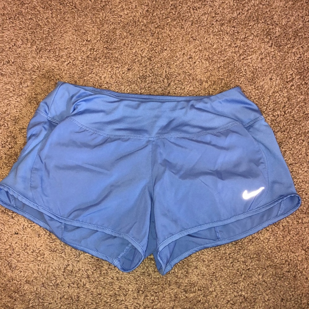 Light blue nike running shorts